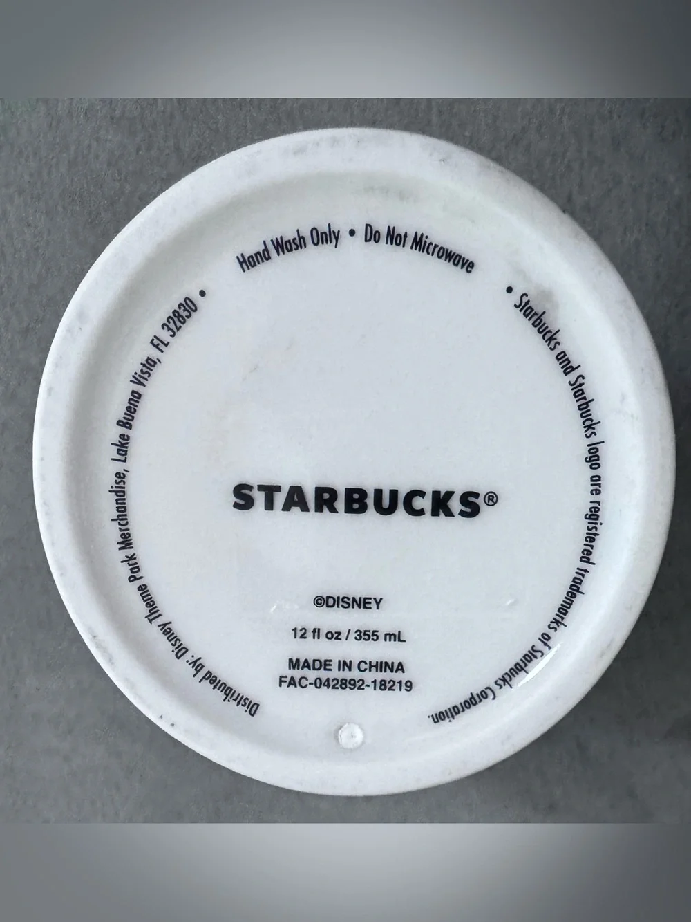 Starbucks Disneyland Travel Mug with Blue Lid and Pink/Blue Graphics